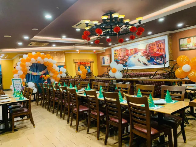 Khu vực ăn uống ấm cúng tại The Pizza Company Buôn Ma Thuột