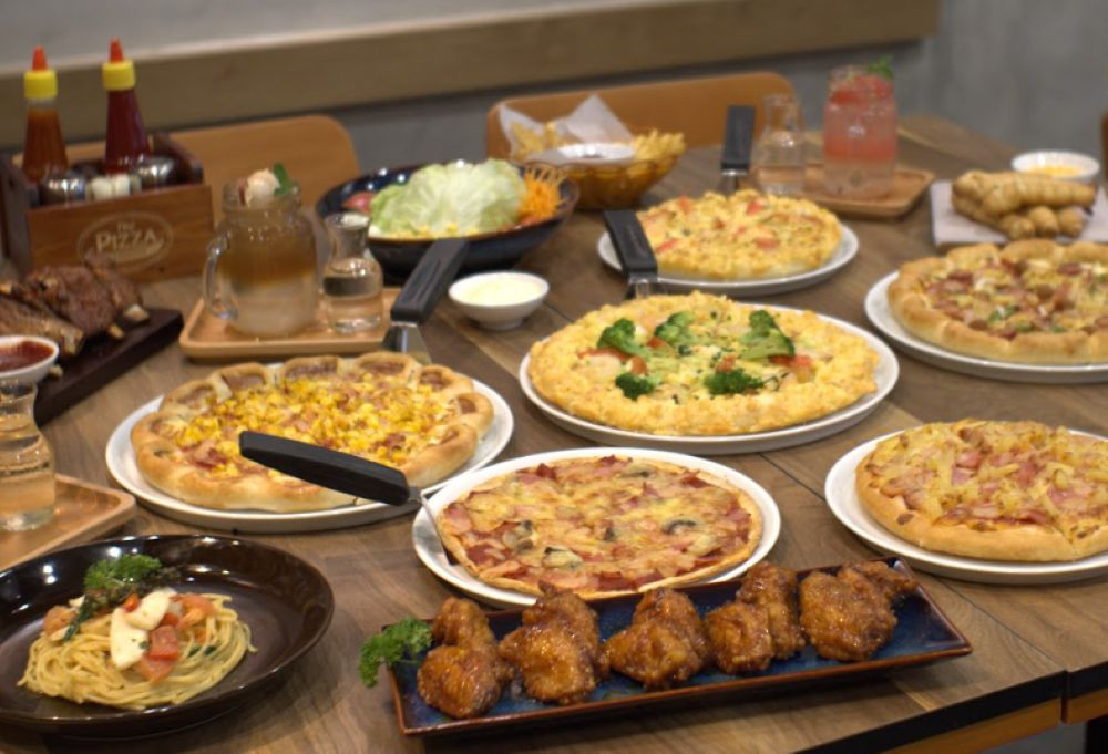 Menu pizza đa dạng với nhiều lựa chọn topping tại The Pizza Company Vincom Trần Duy Hưng