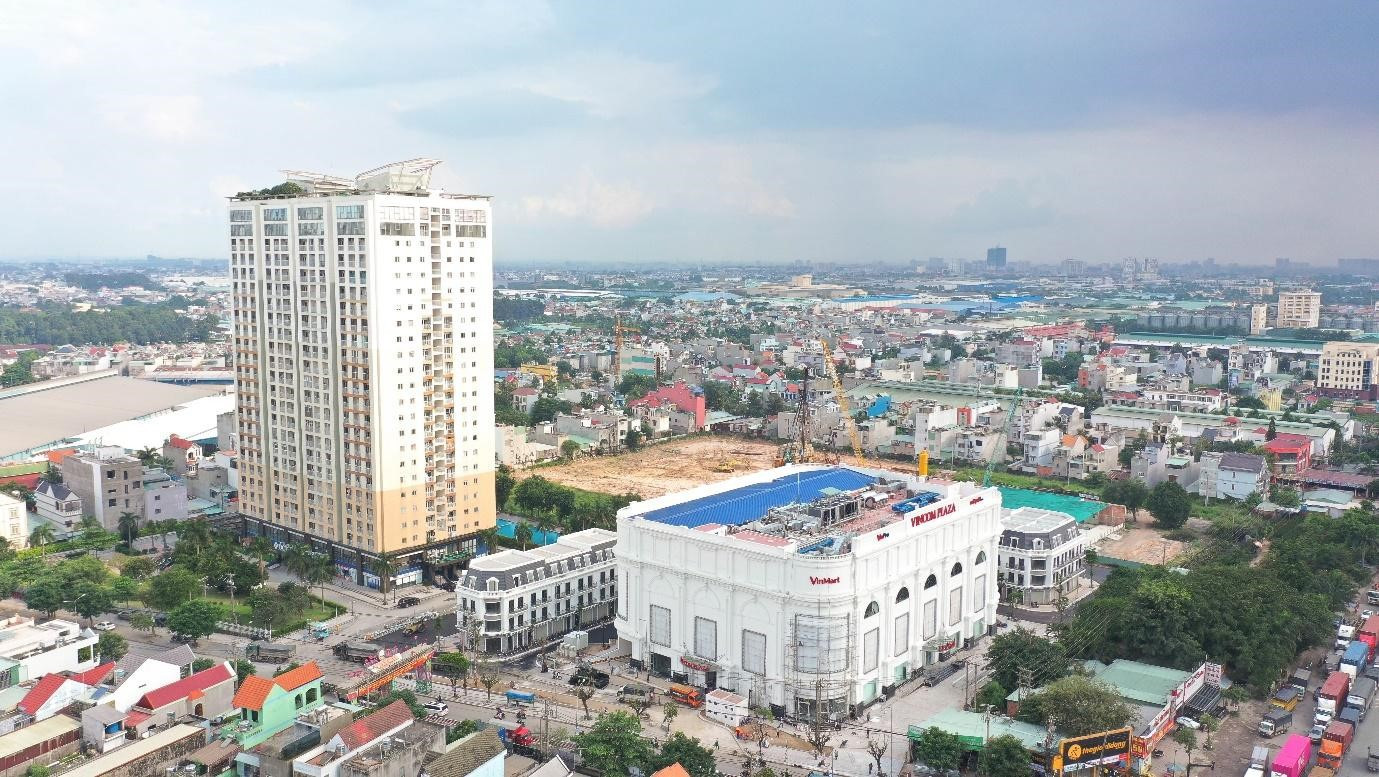 Phối cảnh khu căn hộ Charm City và Vincom Plaza Dĩ An, minh chứng cho sự phát triển đô thị.